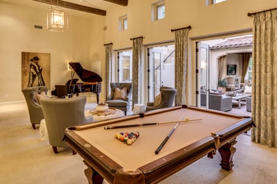 Game room with billiards, grand piano and seating