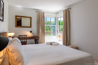 Bedroom 2: Situated in the lower level. King size bed (can be prepared with twin beds on request), a