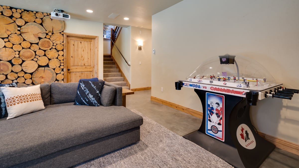 Family room on lower level with air hockey and video games - Image 28