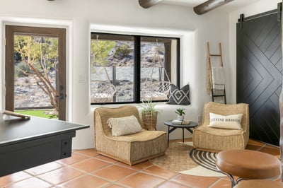 Comfy oversized chairs and bar stools to relax in between games!