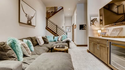 Lower level den with TV and wet bar