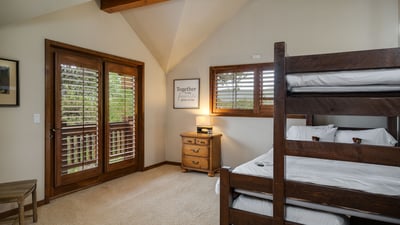 Bunkroom on upper level with XL twin over queen bunk and twin trundle underneath