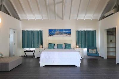 Bedroom 1: King size Bed, Closet, Safe, Ensuite bathroom with two sinks and shower, Air conditioning