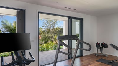 Fitness & Tv Areas: Air conditioned fitness room with treadmill, bicycle, free weights. Entertainmen