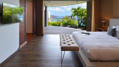 Bedroom 2: Located below the main level with a superb outdoor terrace. King size bed, air conditioni