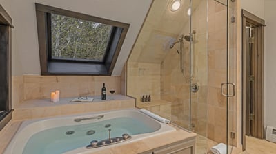 Primary ensuite with beautiful soaking tub and shower