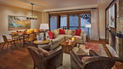 Great room with comfortable seating, deck access