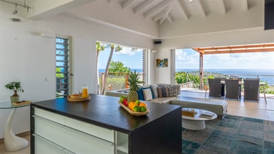 Kitchen & Dining Area: Modern and fully equipped. Electric oven, induction cooker, microwave, refrig