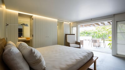 Bedroom 3: Located on a lower level. A king size bed, air conditioning, ceiling fan, safe, a sm
