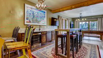 Lower level rec room with games and wet bar