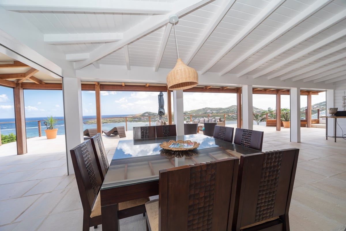 Dining Area: Indoor and outdoor dining room. Large table for 8 people inside with a view of the lago - Image 17