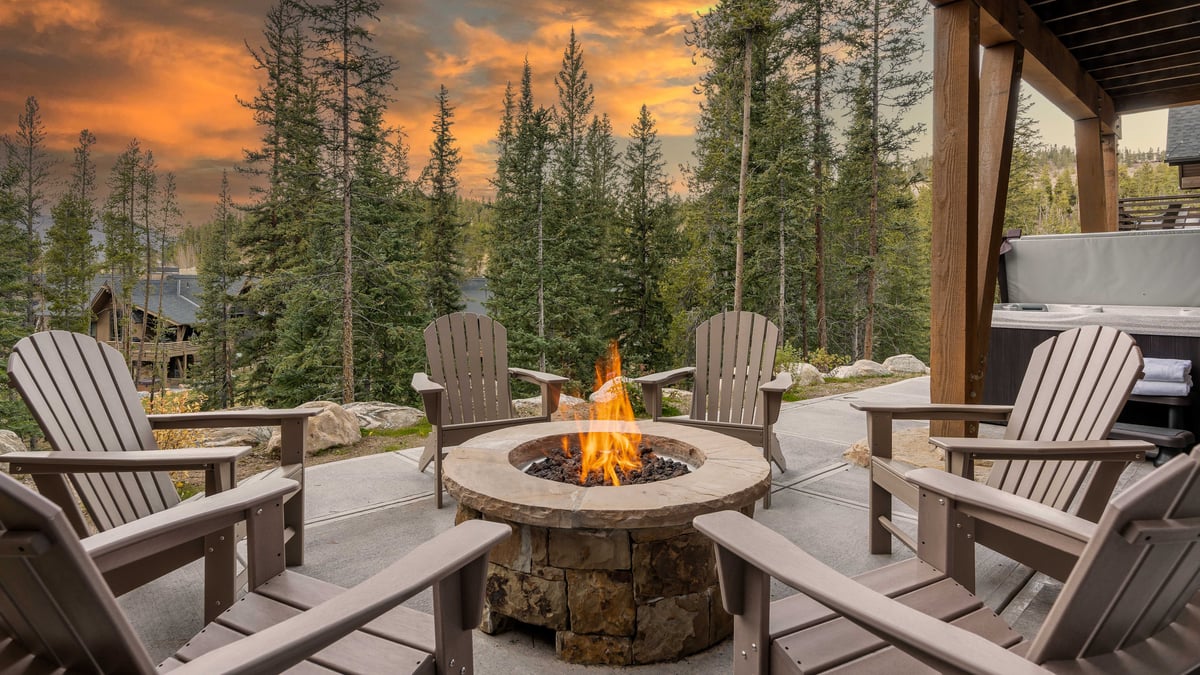 Enjoy cozy sunsets by the fire on the lower patio - Image 5