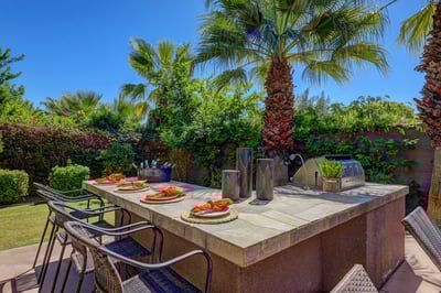 Custom BBQ island with bar seating for 4