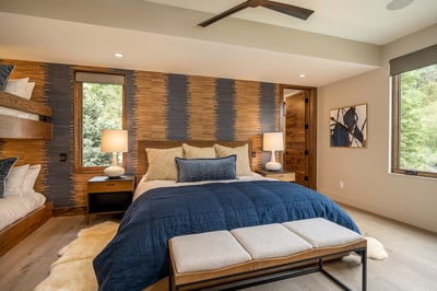 Family suite on upper main level with one king, and one twin bunk