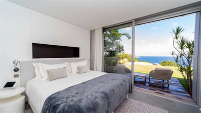Bedroom 6: On the lower level. King size bed, air conditioning, ceiling fan, HD-TV, dish n