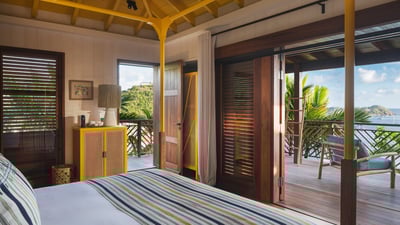 Bedroom 4: On the upper level. King size bed, air conditioning, ceiling fan, safe, dressing roo