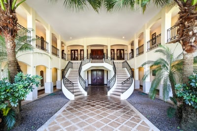 Elegant staircase takes you to the upstairs level!