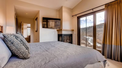 Primary suite on main level with fireplace, TV