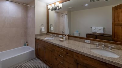 Bedroom with two full beds ensuite