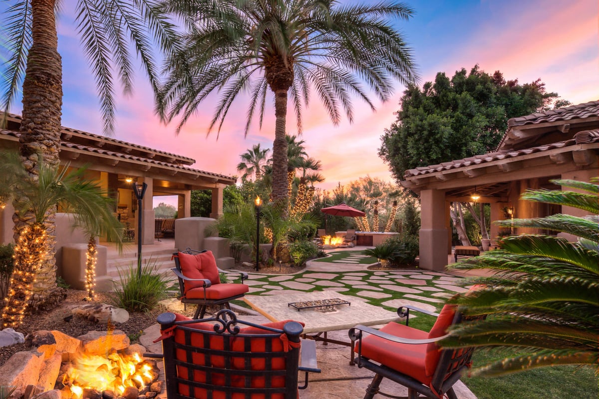 A Cozy Sitting Area by the Outdoor Fire Pit - Image 10