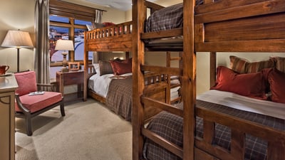 Updated photos coming soon – New bedding configuration is now 1 Twin over Twin bunk and 1 Twin over 