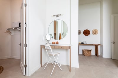 Primary en suite with dual sinks, vanity, large soaking tub and walk-in shower