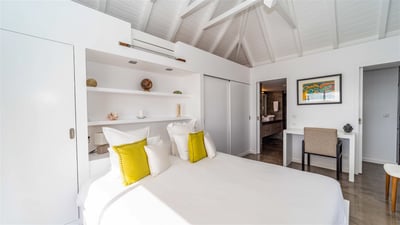 Bedroom: King size bed, air conditioning, ceiling fan, safe. Adjoining bathroom, rain shower, toilet