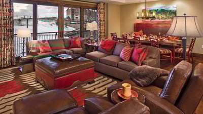Great room with fireplace and balcony access