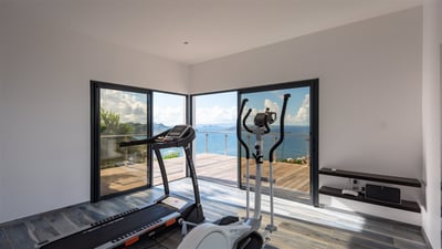 Fitness Area: Located on a lower level. Equipped and air conditioned fitness room. 