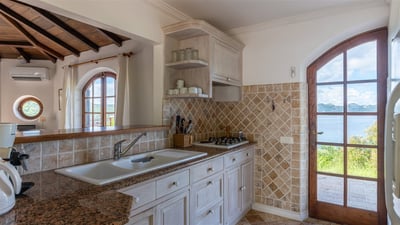 Kitchen & Dining Area: Fully equipped air conditioned kitchen, with electric oven, microwave, fridge