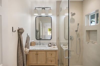 Shared full bath outside the game room.