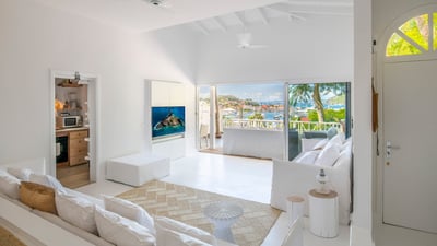 Living Area: Lounge area opening onto the terrace. Air-conditioning, ceiling-fan, HD-TV, Apple TV. &