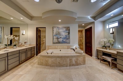 Primary en suite bath with soaking tub, walk in shower, dual vanity and large walk in closet.