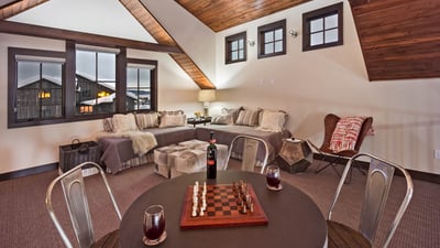 Loft are on upper level with game table and extra sleeping options