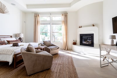 Añejo (primary bedroom suite): king bed, dresser, smart TV, fireplace and coffee/tea bar