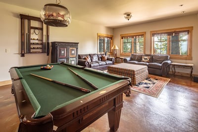 Your own game room awaits, featuring a billiards table.