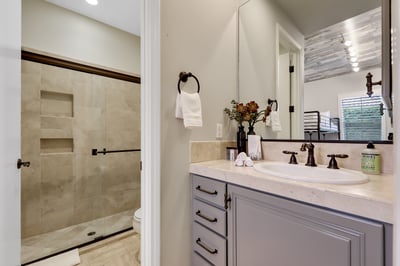 Guest bedroom 2 en suite with walk-in shower.