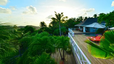 Outdoors: Nice tropical garden surrounding the property. Private parking at the entrance. 