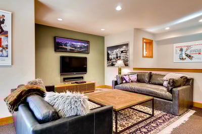 Game room sitting area with TV
