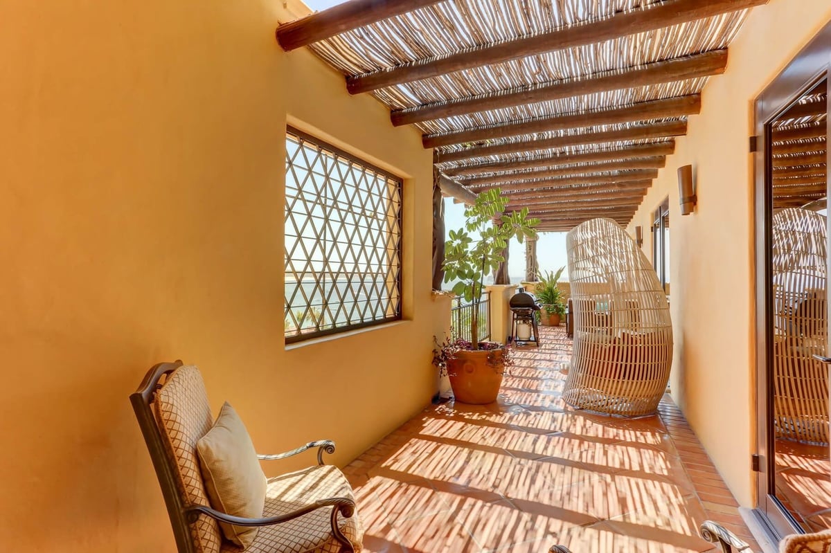 The outdoor terrace of Hacienda Tranquila wraps around the nearly the whole of the home. - Image 3