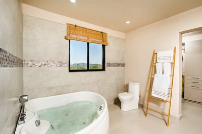 #1. His and Hers Double Sink Bathroom, Each with Its Own Side, and a Bath tub