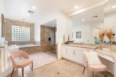Impressive primary en suite with stand-alone rain shower & jetted bathtub and dual vanity