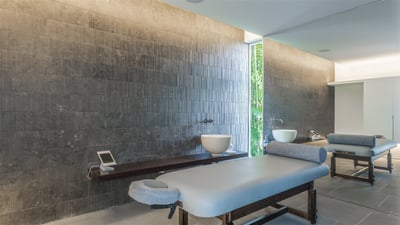 Fitness & Massage Areas: On the main level. Air-conditioned fitness room featuring a treadmill,