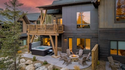 Private back patio with fireplace and hot tub