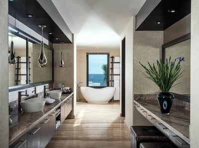 Relax and unwind by taking a warm bath in the freestanding soaker bath tub