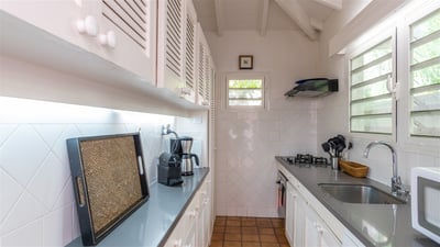 Kitchen & Dining Area: Fully equipped kitchen, fridge, mixer, espresso and Nespresso coffee machines