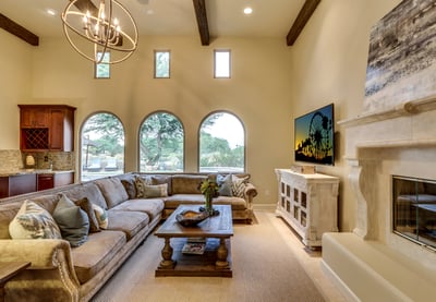 Large HDTV, tall ceilings and adjacent wet bar with ice maker