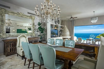 Easily move into the lavish formal dining room that will make every meal feel like a luxury experien