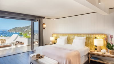 Bedroom 4: On the lower level. A king size bed, air conditioning, ceiling fan, HD-TV, safe