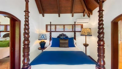Bedroom 5: In a separate bungalow on the back of the property, connected to Bedroom 4. King size bed